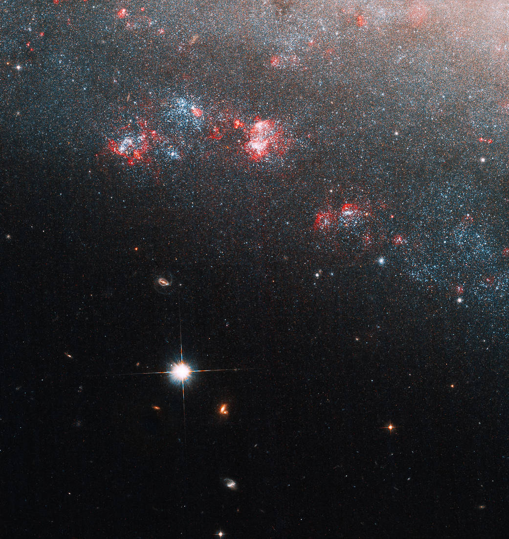哈勃望遠鏡近期拍攝到的矮螺旋星系,代號為「針眼」。