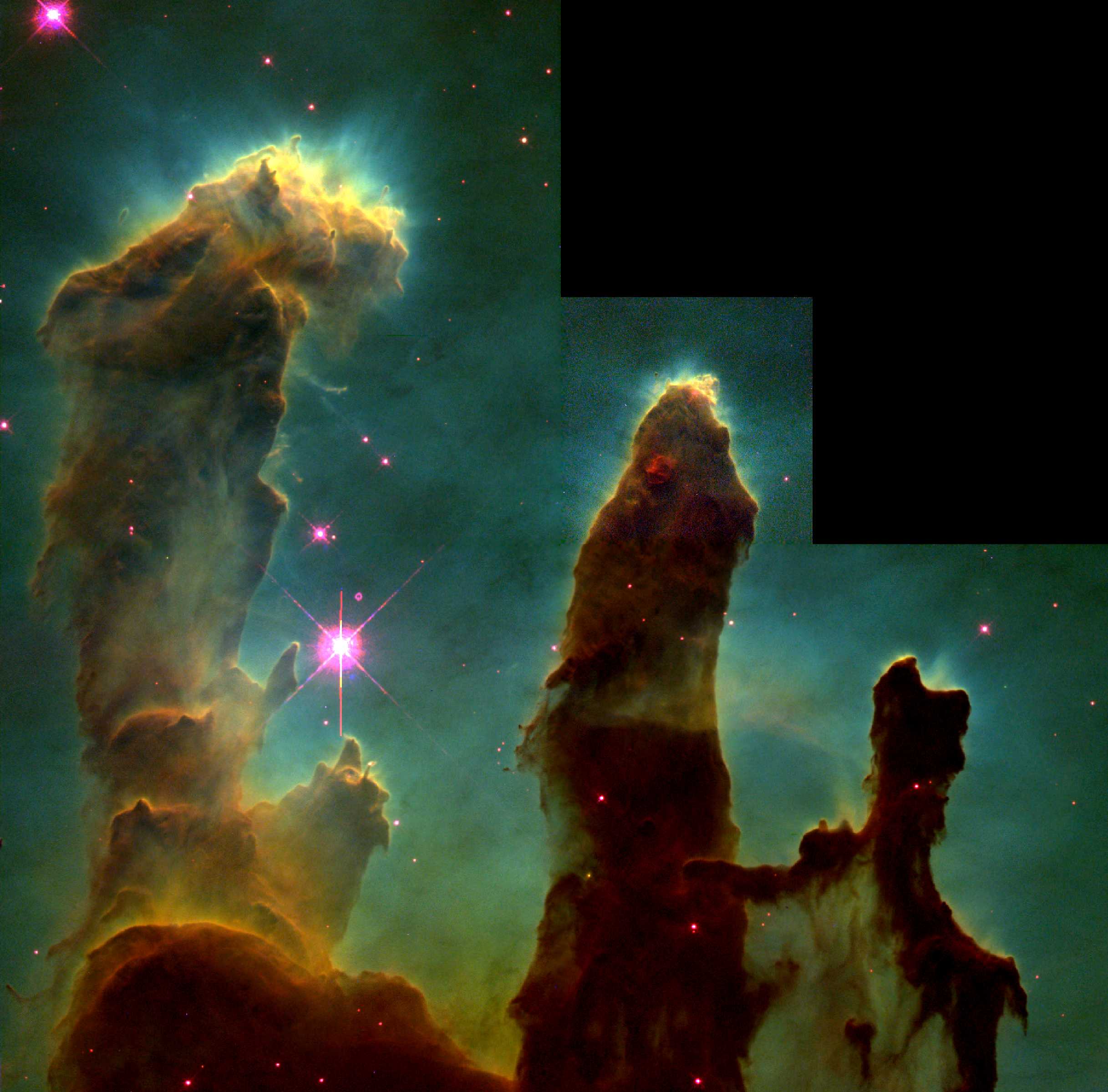 鷹星雲內部的氣體柱「創生之柱」,長度約一光年。頂部的雲氣正在蒸發,表示有新生的恆星正在發散恆星風,將物質吹散。